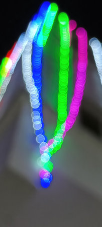 Black background with golden light effects. Horizontal background with blur bokeh effects for...