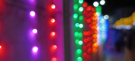 Red glitter vintage lights background. vintage lights background. dark gold and black. defocused Bright glowing lights blurred redの写真素材
