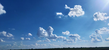 Blue sky with white clouds. Panoramic view of blue sky with white clouds.