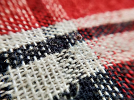 Close up detail of a red and white woolen fabric texture.の写真素材