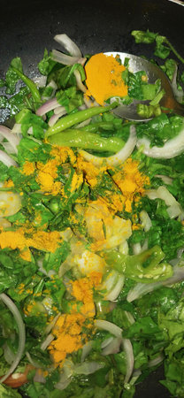Vegetable salad in a wok, closeup of photo