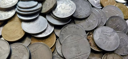 Close-up of a pile of old coins. Background and texture