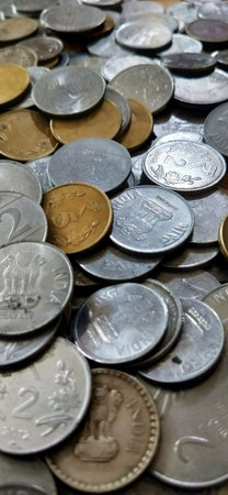 Pile of old coins, close-up, background, texture