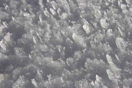 Winter snow surface crystal texture (close up)の写真素材