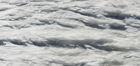 Wind form ice texture on winter mountain snow surface (five shots stitch image)の写真素材