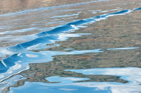 Sea surf on coastline sandの写真素材