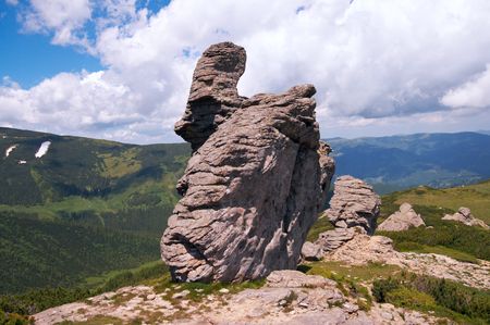 Big stony figure on mountain ridgeの写真素材