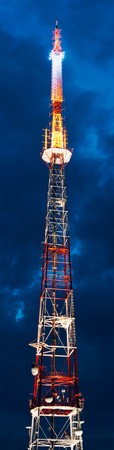 Night sky with clouds above Lviv City and TV tower view (Ukraine, view from Lvov "Vysokyj Zamok" hill). Four shots composite picture.の写真素材