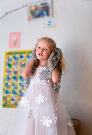 Small girl in holiday carnival  snowflake costumeの写真素材