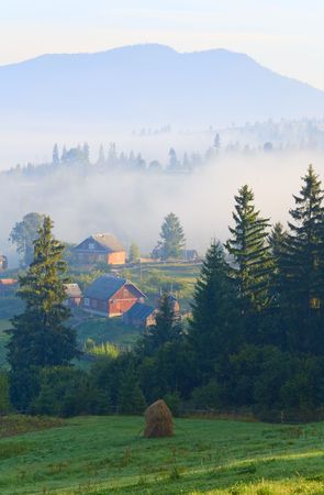 summer misty mountain village (countryside landscape)の写真素材