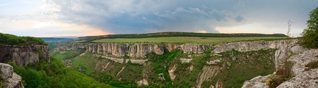 Spring cloudy view of Bakhchisaraj town environs (Chufut Kale, Crimea, Ukraine)の写真素材