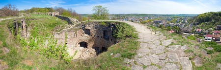 Spring view of Terebovlia castle  ruins and Terebovlya town  on the right (Ternopil Oblast, Ukraine). Built in 1366. Four shots stitch image.の写真素材