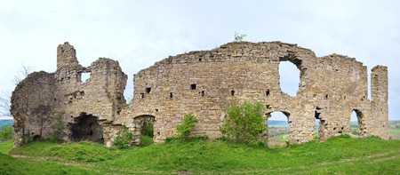 Spring view of Chernokozinetsky castle  ruins (Chernokozintsy village , Kamyanets-Podilsky region,...