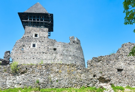 Summer view of Nevytsky Castle ruins (Kamyanitsa  village ,12 km north of Uzhhorod, Zakarpattia Oblast, Ukraine). Built in 13th century.のeditorial素材