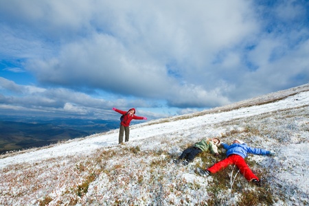 October Carpathian mountain Borghava plateau with first winter snow (and mother with children)の写真素材