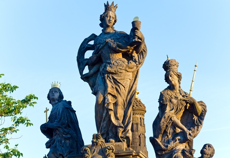 The statue of saints Barbara, Margaret and Elizabeth on Charles Bridge (Prague, Czech Republic). Sculpted by Ferdinand Brokoff in 1707の写真素材