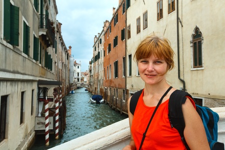 Summer venetian view  and woman - tourist (Venice, Italy)のeditorial素材