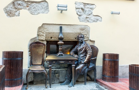LVIV, UKRAINE - MAY 10: monument The inventors of kerosene lamps (about the invention is seated Jan Zeh. Sculptor - Vladimir Tsisaryk) in Lviv City, Ukraine in May 10th 2012のeditorial素材