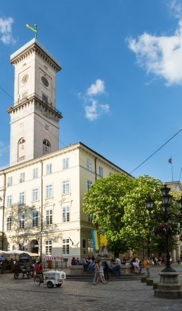 LVIV, UKRAINE - MAY 10:  View on city council building and Neptune monument in Ukrainian football symbols on May 10, 2012 in Lviv City (Ukraine) .のeditorial素材