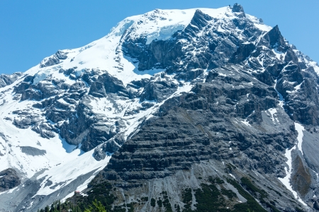 Summer Stelvio Pass with snow on mountain top (Italy)の写真素材