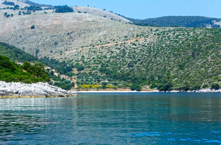 Summer coast view from motorboat (Kefalonia, not far from Agia Effimia, Greece)の写真素材