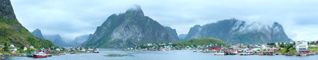 Fishing village Reine (Lofoten, Norway). Summer cloudy panorama.の写真素材