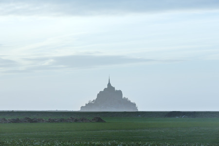 Mont Saint-Michel in March. Evening hazy view. France.のeditorial素材