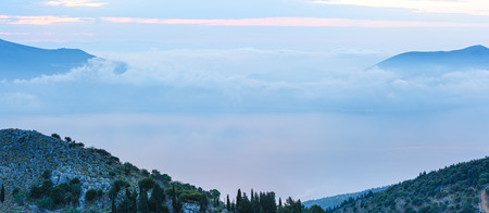 Sunrise misty summer mountain landscape ( Kefalonia, Greece).