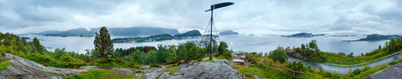 Alesund town (Norway) summer cloudy view from above. Panorama.
