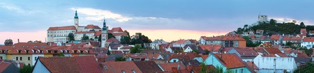 Mikulov town sunset top view (Moravian Region, Czech Republic). The Old town centre and castle (reconstruction in 1719-1730). Panorama.のeditorial素材