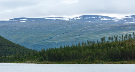 Summer cloudy Otta fjord coast landscape (Norway).の写真素材