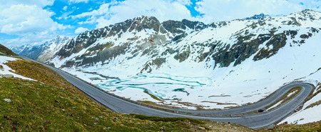 Road in summer Alps mountain and frozen lake (Austria). Panorama.の写真素材
