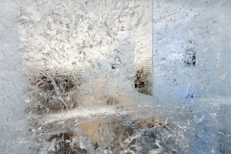 Glacial transparent block of ice (close up) with interesting drawings and patterns. Background.の写真素材