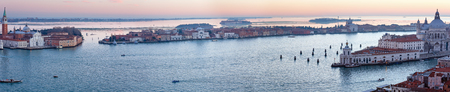 The Island of San Giorgio Maggiore. Venice city (Italy) sunset view. Panorama. All peoples unrecognizableの写真素材