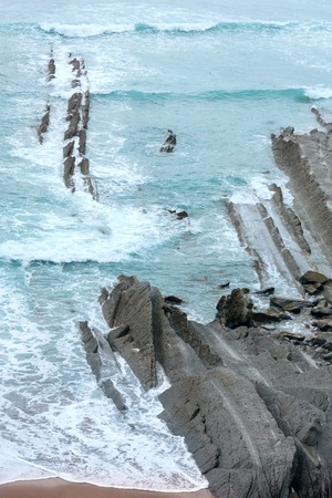 Evening sea rocky coast view (Arnia Beach, Spain, Atlantic Ocean).の写真素材