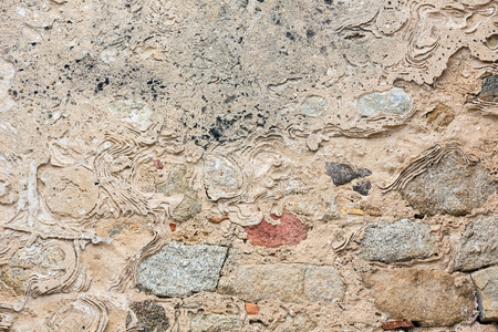 Stony wall close up, background.