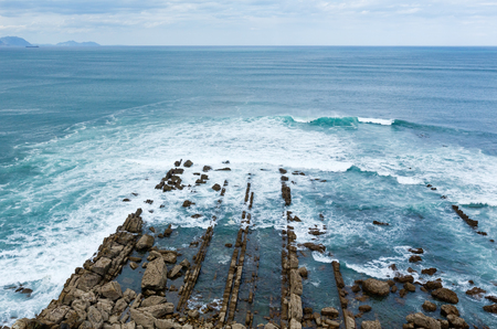 Surf ocean waves (beach Azkorri or Gorrondatxe, Spain).の写真素材