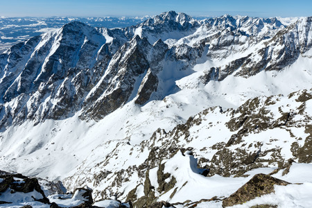 Winter rocky mountain landscape (Tatranska Lomnitsa, High Tatras, Slovakia).の写真素材