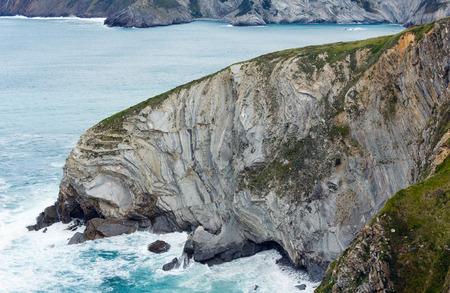 Summer ocean rocky coastline view near Gorliz town, Biscay, Basque Country (Spain).