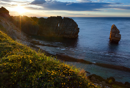 Sunset on blossoming Arnia Beach (Spain, Atlantic Ocean).の写真素材