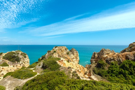 Atlantic ocean rocky coast summer view ( Lagos, Algarve, Portugal).の写真素材
