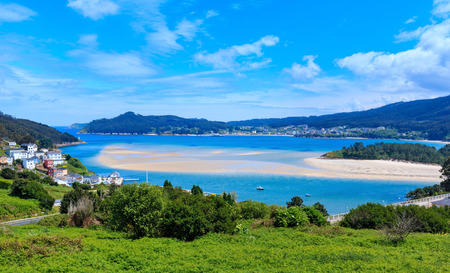 Small harbor and fishing village, Porto do Barqueiro, Galicia, Spain. Summer sea coast landscape.の写真素材
