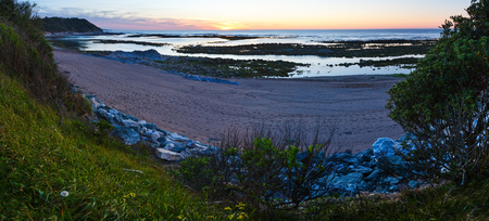 Sunset ocean coast view from beach (near Saint-Jean-de-Luz, France, Bay of Biscay).