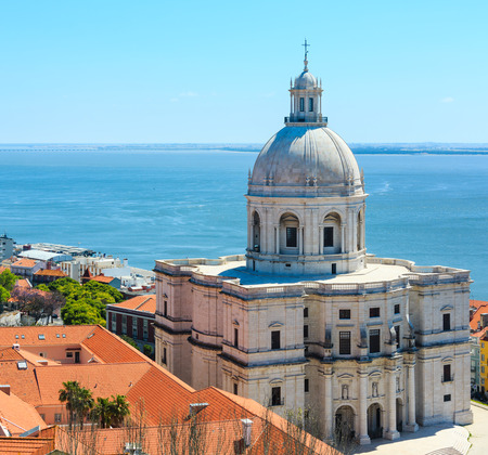 Santa Engracia Church (National Pantheon, 17th-century) and sea view from Monastery roof in Lisbon, Portugal. People unrecognizable. Two shots stitch image.の写真素材
