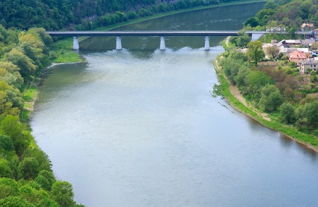 Top picturesque view of the spring Dnister river bend canyon and famous Ukrainian Zalischyky town. Ternopil region, Ukraine, Europe.の写真素材