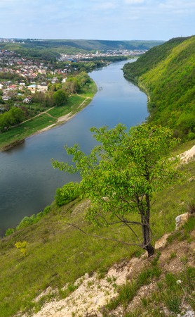 Top picturesque view of the spring Dnister river bend canyon and famous Ukrainian Zalischyky town....