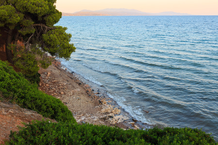 Beautiful Aegean sea coast sunset landscape (Metamorfosi, Sithonia, Halkidiki, Greece).の写真素材