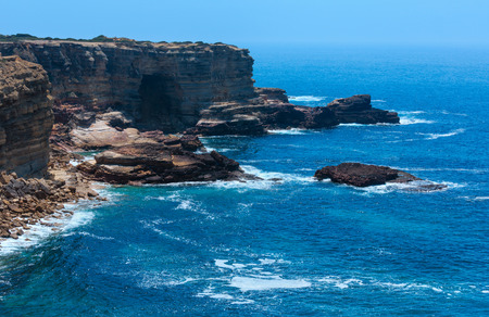 Summer Atlantic rocky coast view, Aljezur, Algarve west, Costa Vicentina, Portugal.