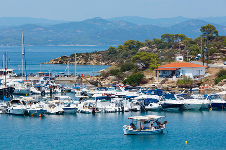 LAGONISI, GREECE - JULY 25, 2016:  Summer Sithonia coastline and Lagonisi port view (Halkidiki, Greece).のeditorial素材