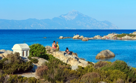 Orange Beach, Chalkidiki, Greece - JULY 22, 2016: Aegean sea coast landscape and Mount Athos in mist.のeditorial素材